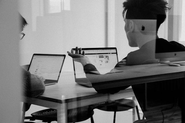 Employee wearing branded shirt symbolizing brand culture alignment